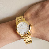 Burberry esfera blanca reloj unisex de acero inoxidable chapado en oro amarillo BU9003