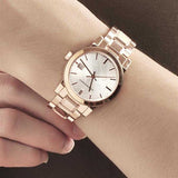 Burberry BU9104 - Reloj para mujer, acero inoxidable, esfera blanca, oro rosa suizo